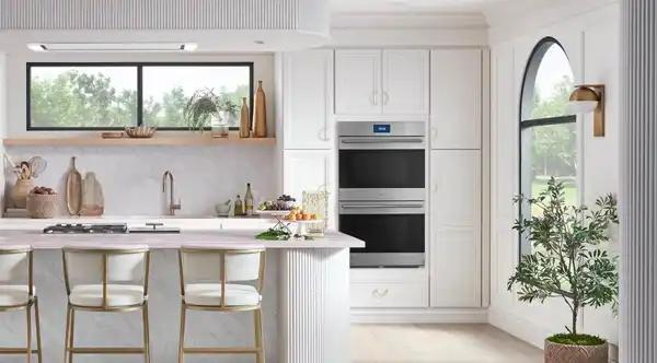 A kitchen featuring a Wolf double oven